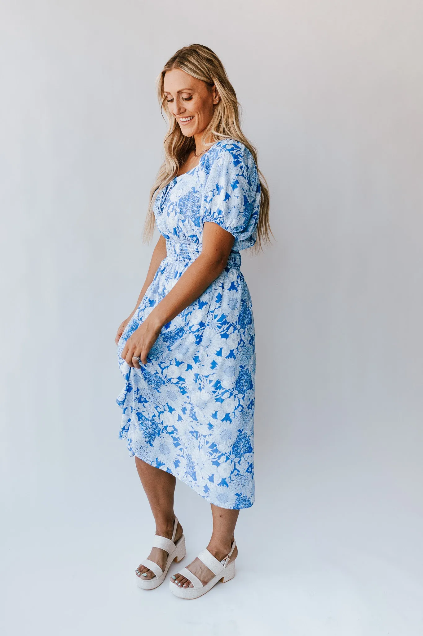 The Challis Smocked Detail Dress in Blue Floral